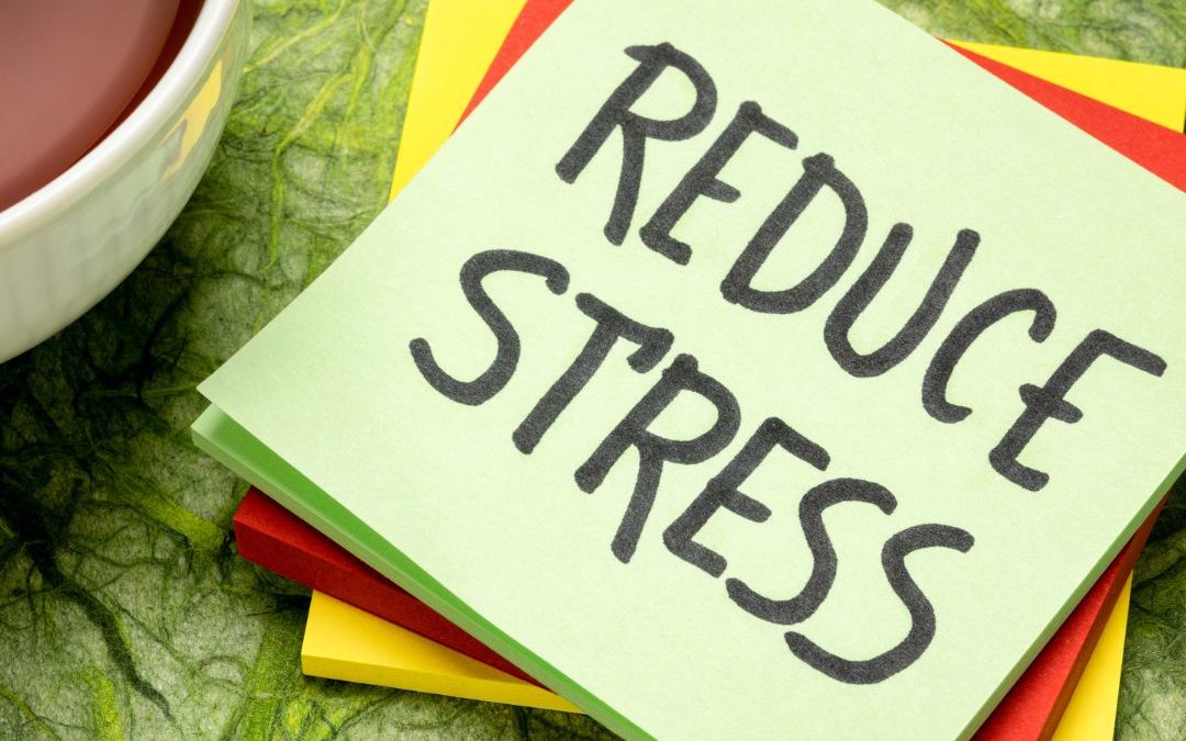Reduce Stress written on a sticky note pad