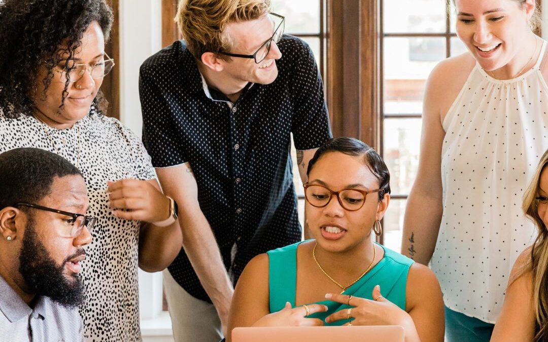 Coworkers actively participating in a team meeting